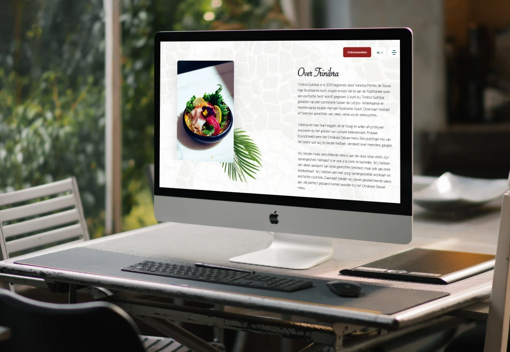 De pagina Over Trinibra op een iMac